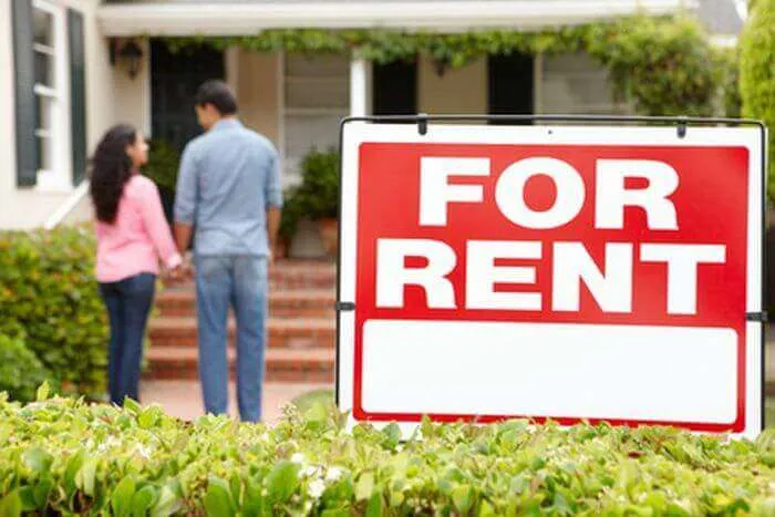 House with a for rent sign
